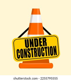 Under construction sign on traffic safety cone