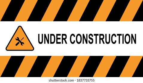 Under construction sign, construction tape. Black and yellow line striped.