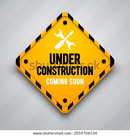 Under Construction Sign With Tools