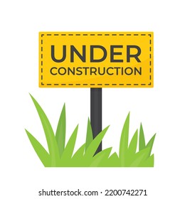 under construction signboard in the grass- vector illustration