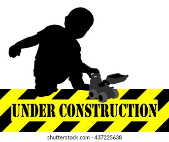 en construcción, niño jugando con un juguete bulldozer