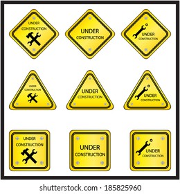 Under construction signs set, isolated on white background, vector illustration.