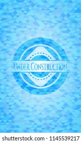 Under Construction sky blue emblem. Mosaic background