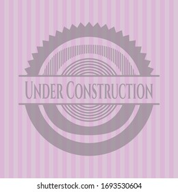Bajo el emblema rosa vintage de la Construcción. Ilustración vectorial. Detallado.
