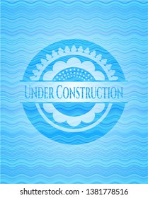 Under Construction water wave representation badge.
