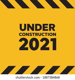 Under construction website page. Warning tape banner