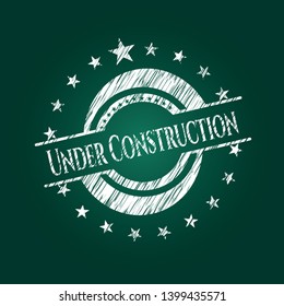 Under Construction written on a blackboard. Vector Illustration. Detailed.