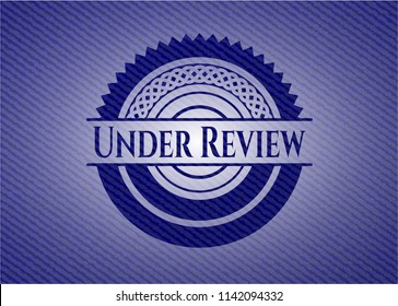 Under Review with denim texture