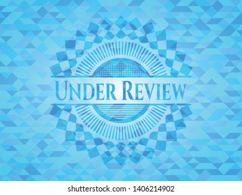 Under Review realistic light blue emblem. Mosaic background