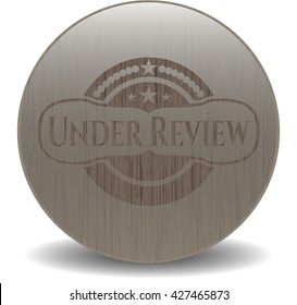 Under Review vintage wood emblem