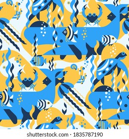 Under water sea seamless pattern with whale, fish, jellyfish, tropical fish, crab, coral, seashells, seaweed. Perfect for fabric, textile, wallpaper. Sea creatures design geometric pattern.