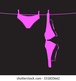 Underclothes on a clothesline, silhouette vector illustration