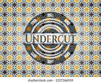 Undercut arabic badge. Arabesque decoration.