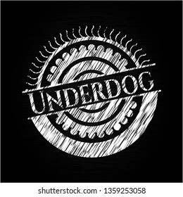 Underdog chalkboard emblem on black board