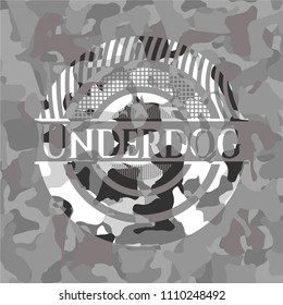 Underdog on grey camouflage texture