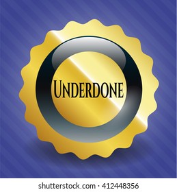 Underdone gold badge or emblem