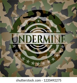 Undermine camouflaged emblem