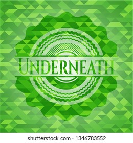 Underneath green mosaic emblem