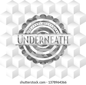 Underneath grey emblem with geometric cube white background