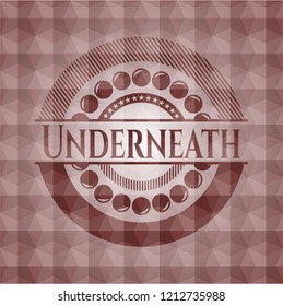 Underneath red seamless emblem or badge with abstract geometric pattern background.