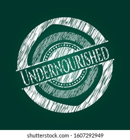 Undernourished chalkboard emblem on black board. Vector Illustration. Detailed.