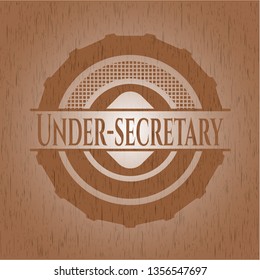 Under-secretary badge with wooden background