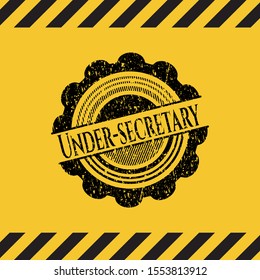 Under-secretary inside warning sign, black grunge emblem. Vector Illustration. Detailed.