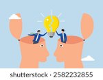 Understanding lead to success, businessmen partner open their head to connect lightbulb jigsaw