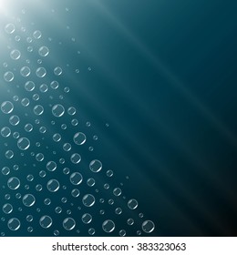 Underwater background. Underwater air bubbles in the deep ocean. Fizz bubbles. Abstract aqua art background design template. Blue underwater surface and air bubbles.  Shiny transparent bubbles. 