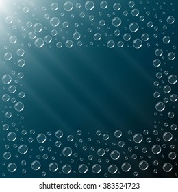 Underwater background. Underwater air bubbles in the deep ocean. Fizz bubbles. Abstract aqua art background design template. Blue underwater surface and air bubbles.  Shiny transparent bubbles. 