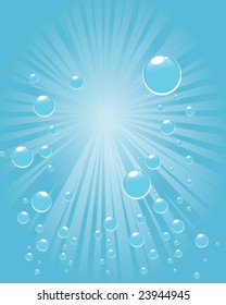 Underwater bubbles against beautiful refracting sunlight.