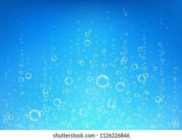 Underwater fizzing air, water or oxygen  bubbles on blue  background. Fizzy sparkles in sea, aquarium. Fizz. Undersea vector texture with rays of sunlight.