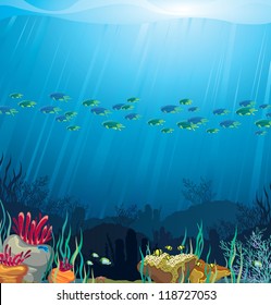 Underwater life - Coral reef with fish on a blue sea background