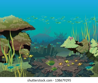 Underwater life with coral reef and school of fish in the blue sea.