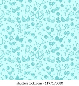Underwear in a seamless pattern. Blue, background and drawing of panties and bras in endless pattern.