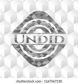 Undid realistic grey emblem with cube white background