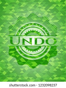 Undo realistic green emblem. Mosaic background