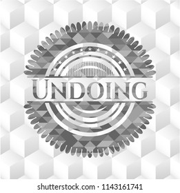 Undoing retro style grey emblem with geometric cube white background