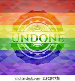 Undone emblem on mosaic background with the colors of the LGBT flag