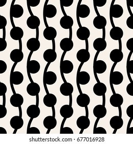 Uneven bars and dots seamless pattern. Free hand drawn black stripes and round spots on white background. Abstract monochrome texture.