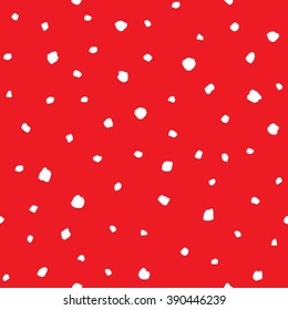 Uneven specks, spots, blobs, splashes seamless pattern. White and bright red  Free hand drawn speckles, flecks, stains or dots of different size texture. Abstract background.