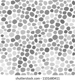 Uneven spots, spots, pebbles of different size. Seamless pattern. Abstract  dotted texture background.