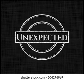 Unexpected chalkboard emblem on black board