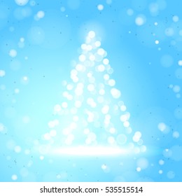 Unfocused Blurred Lights and Christmas Tree on the Light Blue Square Background 