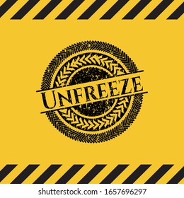 Unfreeze black grunge emblem with yellow background. Vector Illustration. Detailed.