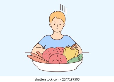 Unhappy boy child sit at table near plate with vegetables. Upset small kid refuse eating healthy veggies. Nutrition, diet and children. Vector illustration. 