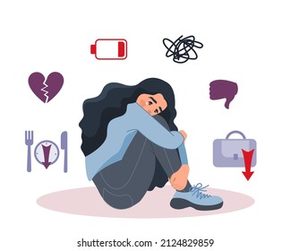 An unhappy depressed girl is sitting on the floor. The girl suffers from failures in her personal life, emotional burnout, problems at work, fatigue and a downed regime. The concept of mental health