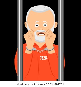 Unhappy elderly prison in handcuffs standing behind the prison bars