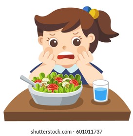 Unhappy girl doesn't want eat healthy vegetables.