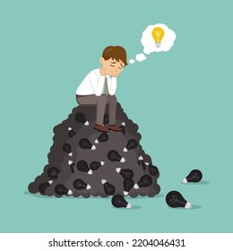  Unhappy male employee sitting on pile of unworkable light bulbs,  illustrator vector cartoon drawing image painting